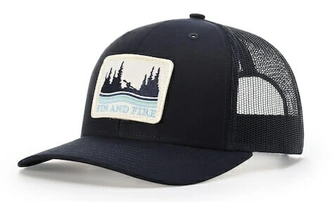 black richardson hat with forest scene