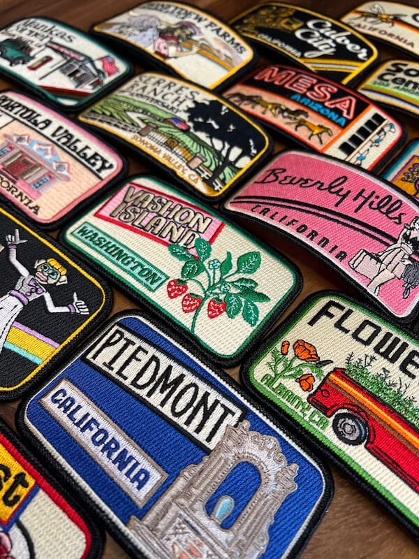 group shot of many different patches on a table